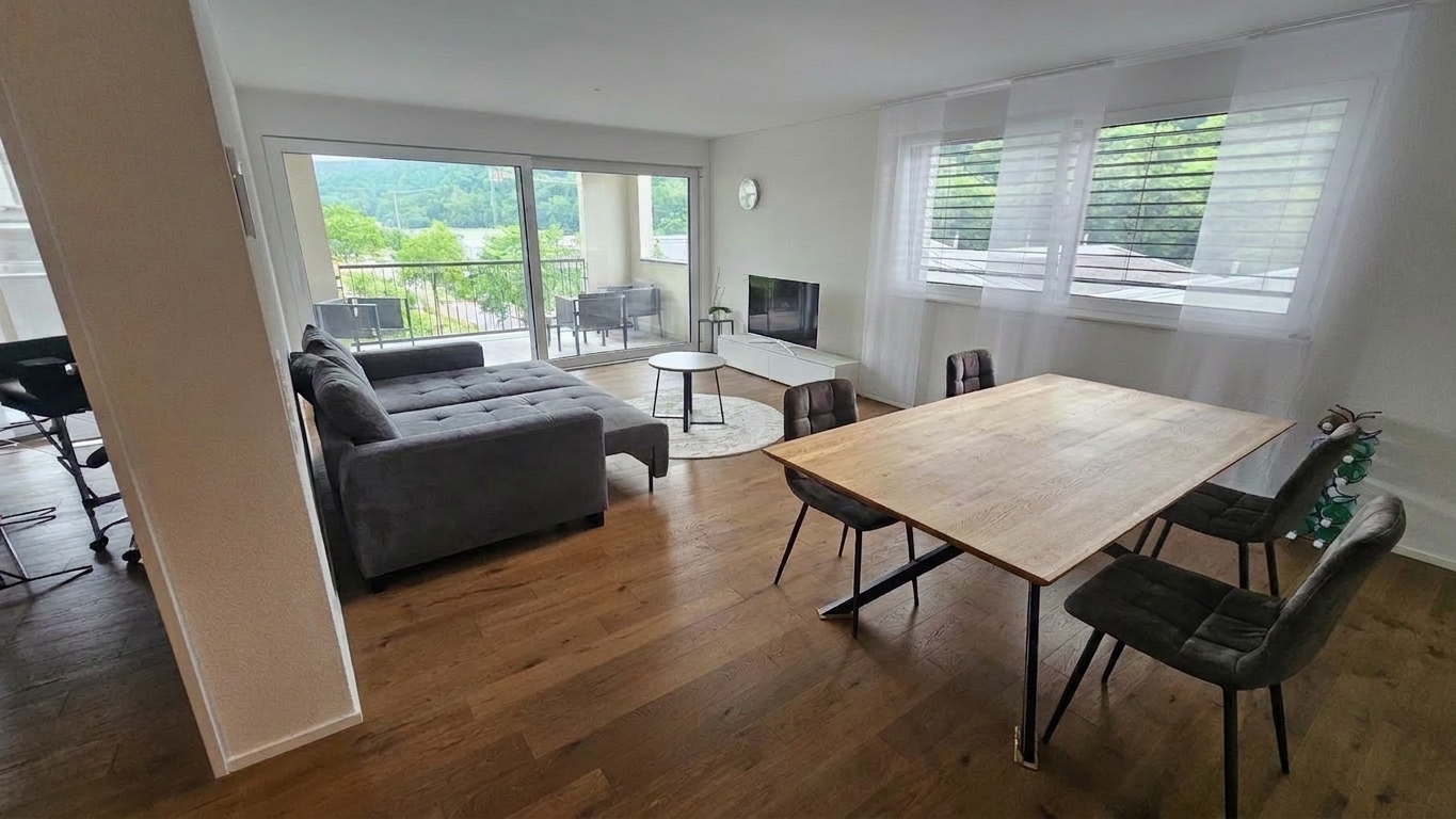 Vermietete 2.5-Zi-Neubauwohnung mit 20 m² Balkon – Tiefgaragenplatz inklusive - 2