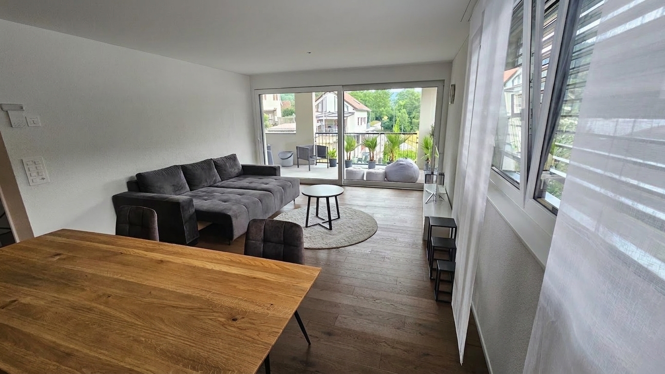 Vermietete 2.5-Zi-Neubauwohnung mit 20 m² Balkon – Tiefgaragenplatz inklusive - 3